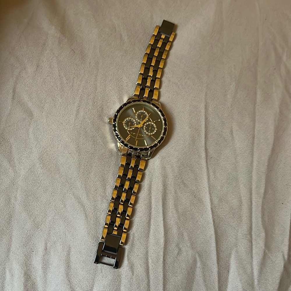 This is a Kendall+Kylie watch. Black and gold. Like brand new out the box.